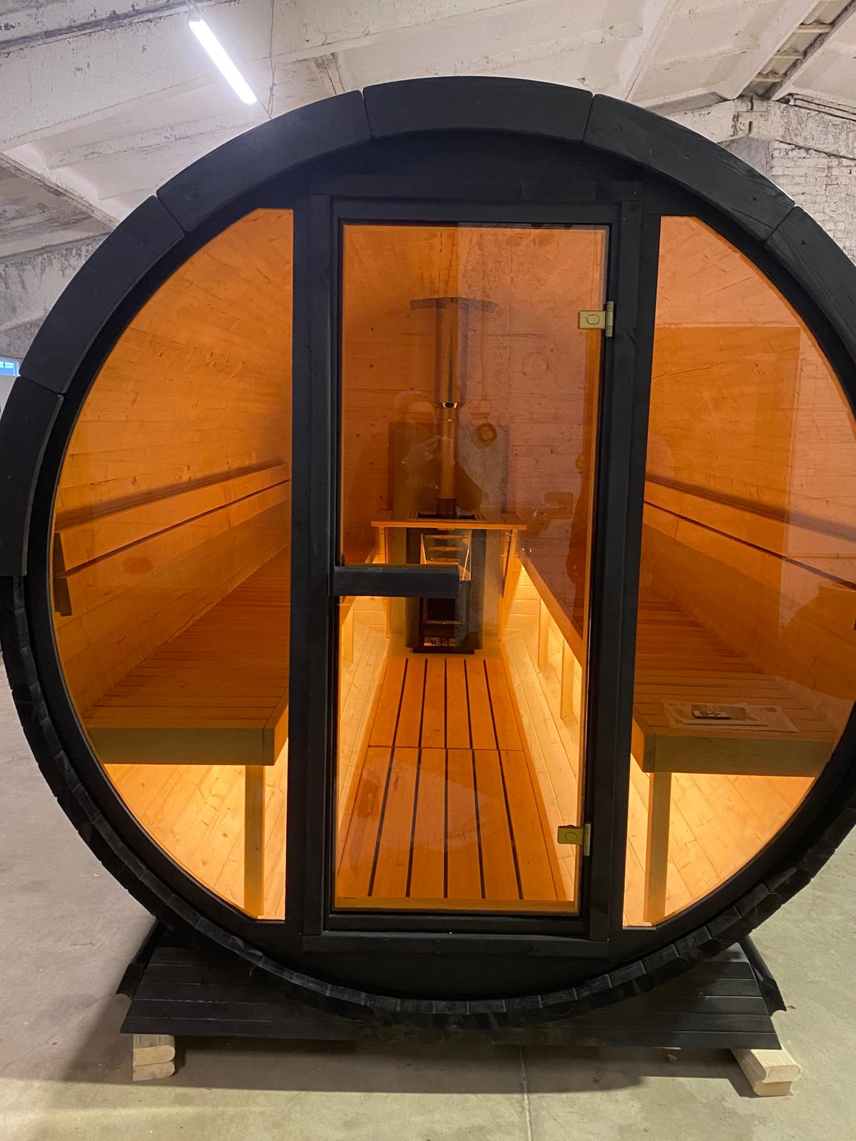 Sauna tonneau deux pièces, façade vitrée éclairée